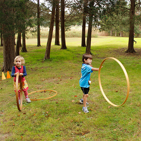 Having fun rolling hoops